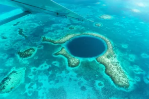 aerial view of the great blue hole, one of the best things to do in belize
